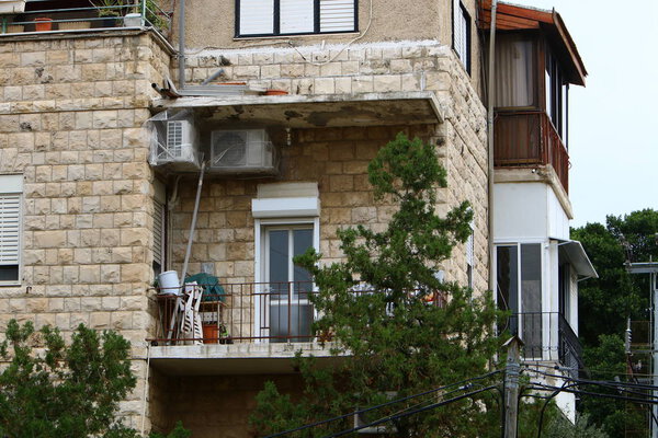 The balcony in architecture is a platform with a railing, reinforced on beams protruding from the wall.
