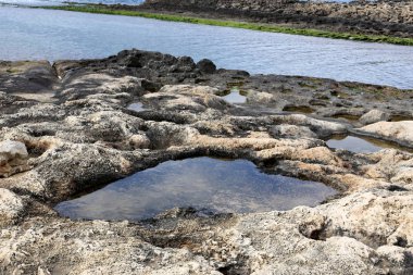 İsrail'de Akdeniz kıyılarında dağlarda taş ve kaya doku ve renk 
