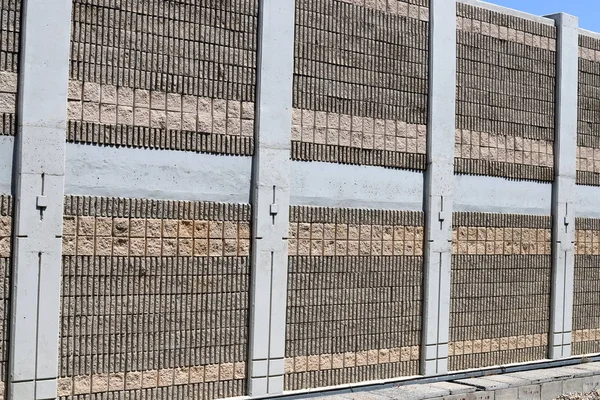 high stone and concrete wall built in the north of Israel