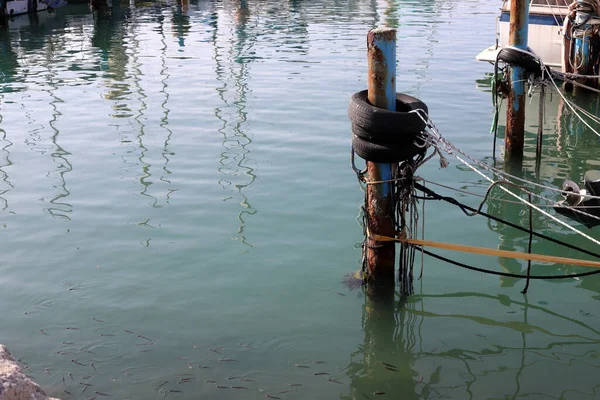 stock image berth for mooring boats and boats in a seaport in northern Israel 