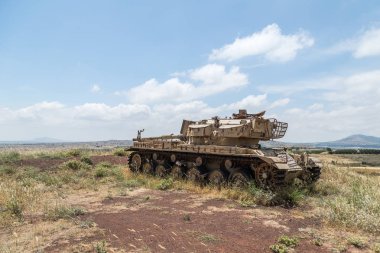 Yok edilen İsrail tankı İsrail 'in Golan Tepeleri' ndeki Kıyamet Günü 'nün (Yom Kippur Savaşı) ardından Suriye sınırına yakın.