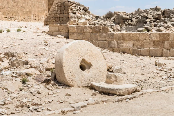 Stone mill from the winery in the Nabataean city of Avdat, located on the incense road in the Judean desert in Israel. It is included in the UNESCO World Heritage List.