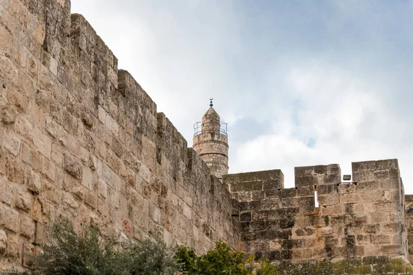 Fragment of the city walls and the Tower of David near the Jaffa Gate in old city of Jerusalem, Israel