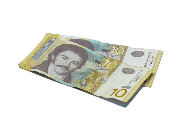 Duas notas de 10 dinares sérvios com um retrato de um linguista Vuk Karadzic isolado sobre um fundo branco — Fotografia de Stock