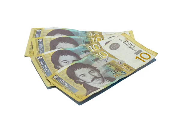 Fyra sedlar värda 10 serbiska dinarer med ett porträtt av en lingvist Vuk Karadzic isolerad på en vit bakgrund — Stockfoto