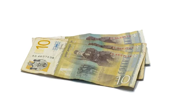 Drie bankbiljetten ter waarde van 10 Servische dinars met een portret van een linguïst Vuk Karadzic geïsoleerd op een witte achtergrond — Stockfoto
