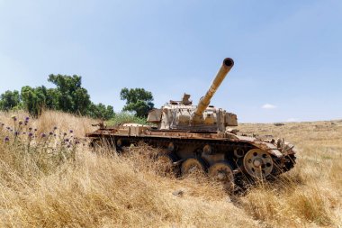 Destroyed Israeli tank is after the Doomsday (Yom Kippur War) on the Golan Heights in Israel, near the border with Syria clipart