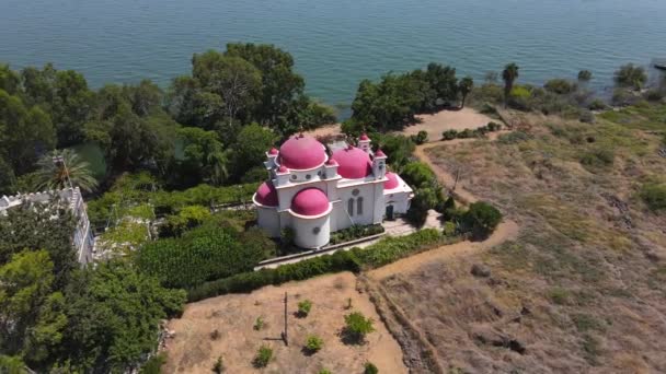 Aerial view of the Church of the Apostles and Greek Orthodox Monastery are located on the shores of the Sea of Galilee, not far from Tiberias city in northern Israel — Stock Video
