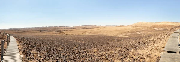 A panoramic view of the Judean Desert from HaMinsara - a sandstone hill in the Ramon crater area, formed by the release of magma.