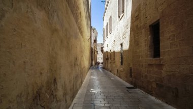 Mdina, Malta, 04 July, 2013 :  Old buildings on a Triq San Pawl St Pauls street in historical part of Mdina old city in Malta
