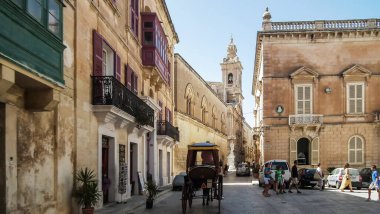 Mdina, Malta, 04 July, 2013 : Old buildings on Triq San Pawl St Pauls street in a historical part of Mdina old city in Malta