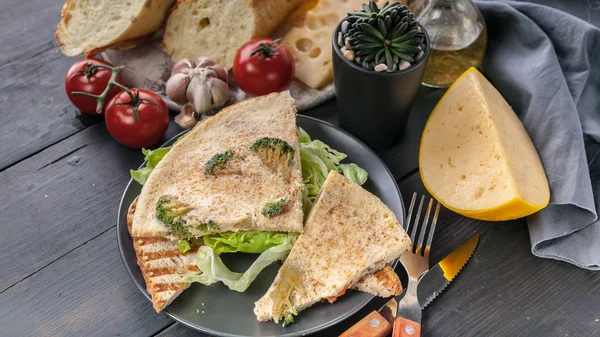 Food banner. Omelette with vegetables and cheese on toast with ice salad. Tasty breakfast.