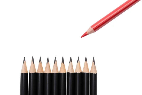 Red pencil among black ones on white background — Stock Photo, Image
