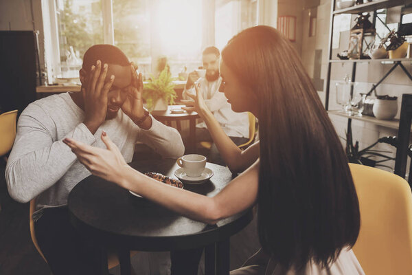 Young couple men and women find out relationship