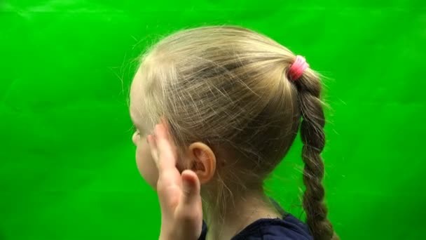 The girl adjusts lightly blond hair on her head. Profile — Stock Video