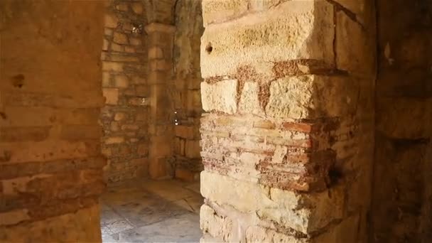 Columns and walls of the temple of clay and stone built in the IV century AD — Stock Video