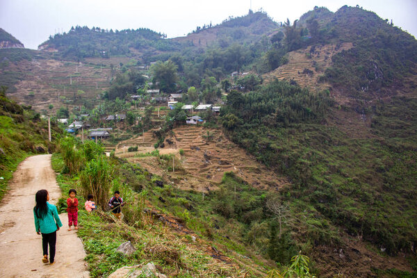 Ha Giang, Vietnam - March 18, 2018: Life in a village surrounded by mountains and fog in the northernmost province of Vietnam