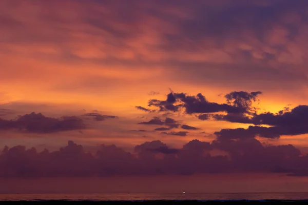 Krabi, Thailand - May 5, 2018: Purple sky over Ko Lanta island at dusk