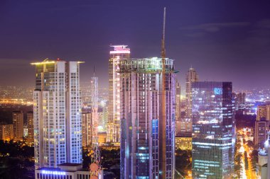 Manila, Philippines - Feb 25, 2018 : Eleveted, night view of Makati, the business district of Metro Manila clipart