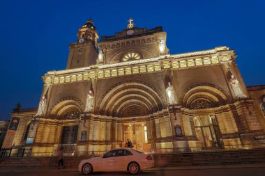 Manila, Philippines - Feb 10, 2018 : Night view of Manila Cathedral located in the Intramuros district of Manila, Philippines clipart
