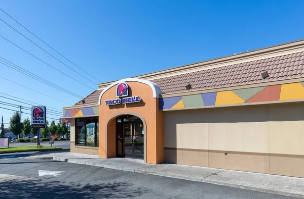 Portland, Oregon - Sep 3, 2018 : Exterior of Taco Bell fast-food restaurant with sign and logo.