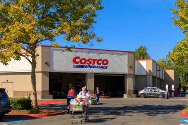 Portland, Oregon - Sep 8, 2018 : Costco Wholesale storefront. Costco Wholesale Corporation is largest membership-only warehouse club in US. clipart