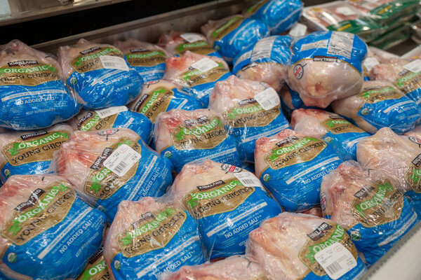 Packed chicken parts ready for purchase, in the meat aisle at Costco
