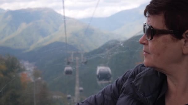 Profile Senior Woman Funicular Cabin Looking Window Mountains — 图库视频影像