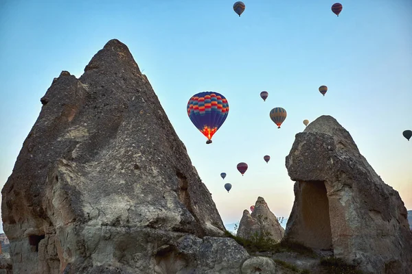 Beautiful balloons against the backdrop of a mountain landscape in the summer.