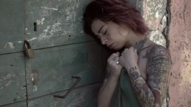 portrait of violence, sadness, depression, wounded young woman