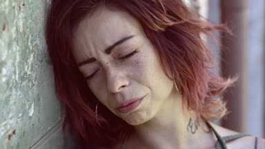 portrait of violence, sadness, depression, wounded young woman