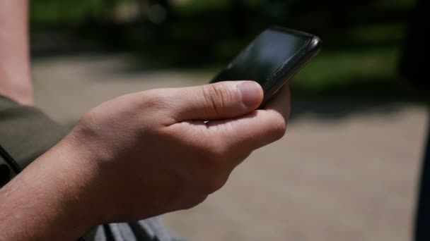 Focus Male Hand Holding Smartphone — Stock Video