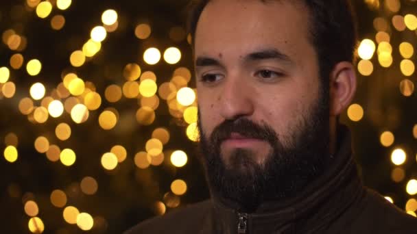 Close Portrait Pensive Daydreaming Young Man Christmas Time — Stock Video