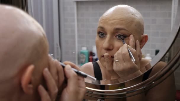 Bald Woman Cancer Puts Makeup Front Mirror — 图库视频影像