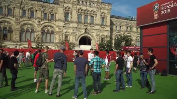 MOSCOW, - July 1: Football fans from different countries play football in fan zons at the Red Square during FIFA World Cup 2018. July 1, 2018 in Moscow, Russia. — Stock Video