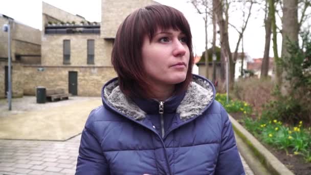 Girl walking at the European city. Bruges Belgium . slow motion. — Stock Video