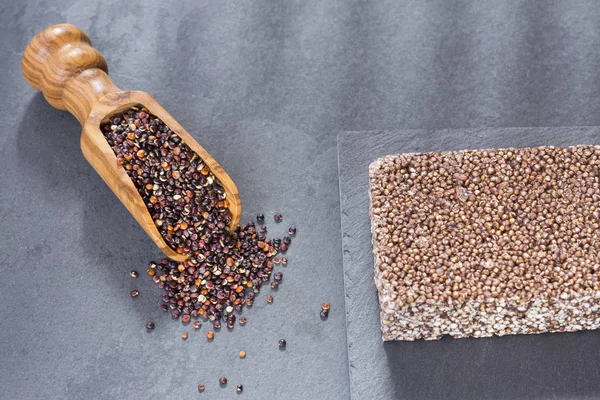 Black seeds of quinoa. Quinoa cereal bar. View from above - Chenopodium quinoa