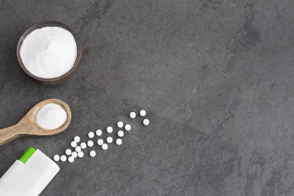 Natural sweetener in powder from stevia plant - Stevia rebaudiana. Top view