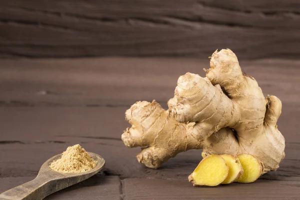 Fresh ginger root and ground ginger spice - Zingiber officinale