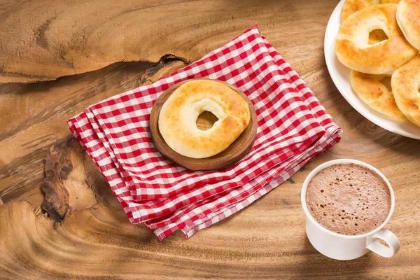 Pandequeso traditional Colombian food - Hot drink chocolate.