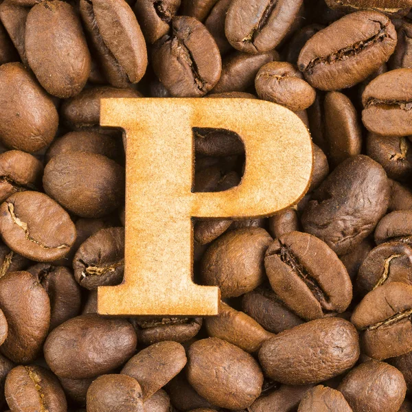 字母表的字母表在木背景的咖啡豆 科韦亚 — 图库照片