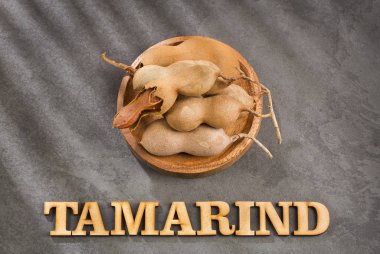 Demirhindi tropikal meyve - Tamarindus indica. Metin alanı