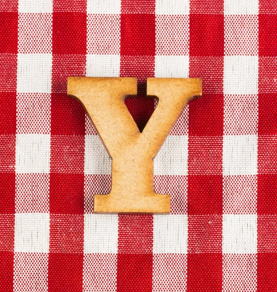 Letter Y of the alphabet - Red checkered fabric tablecloth.