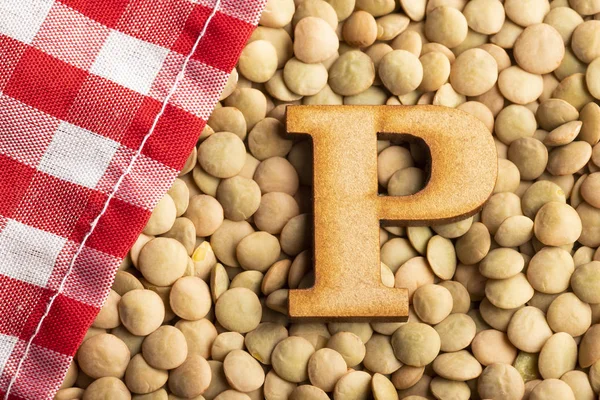 Letter P, Lentils with checkered napkin - Top view