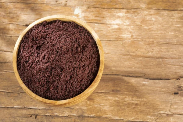 Acai berries powder - Euterpe oleracea. Wood background — Stock Photo, Image