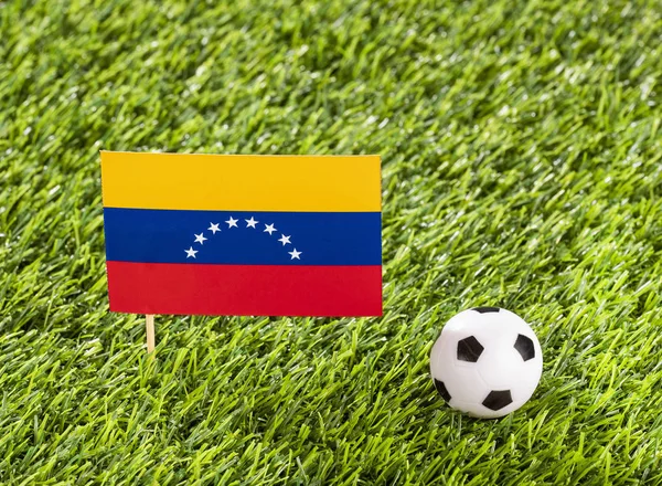 Venezuelská národní vlajka s fotbalovým míčkem na stadionu-textové pole — Stock fotografie