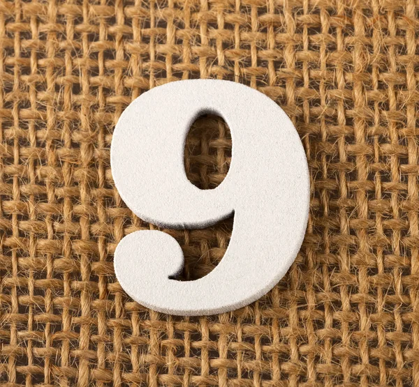 Αριθμός 9-υφή φόντου με λινάτσα — Φωτογραφία Αρχείου