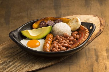 Bandeja paisa, typical dish at the Antioqueno region of Colombia clipart