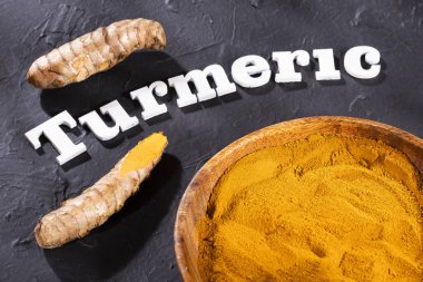 Kökleri ve zerdeçal tozu - Curcuma longa.