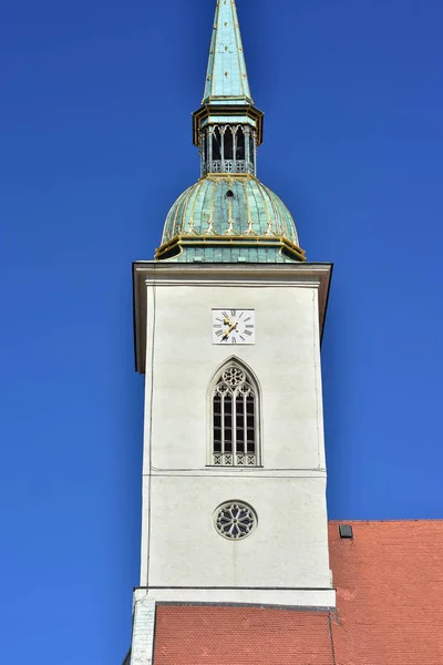 Gothic spire of St Martin cathedral in Bratislava dominates skyline of Old Town.